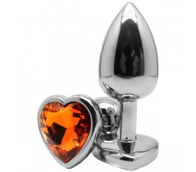 Серебристая анальная втулка с оранжевым кристаллом-сердцем - 7 см.